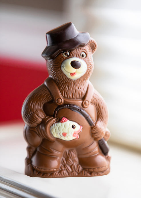 Delightful Fisher Bear handcrafted from delicious Belgian Chocolate and all-natural ingredients